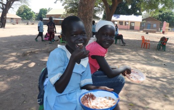 Girls eating Mary's Meals in South Sudan