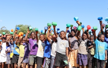 2026 - Malawi - Children holding mugs