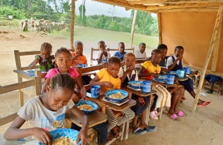 Children eating Mary's Meals in Liberia