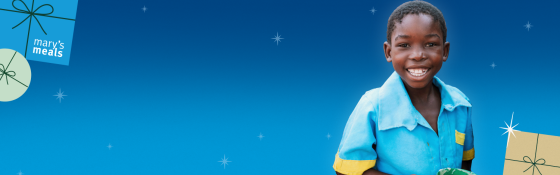 Starry night background with a smiling child imposed on top. 