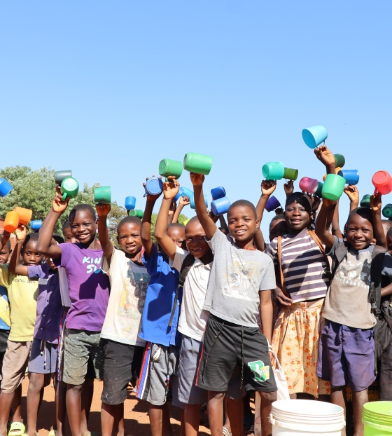 2026 - Malawi - Children holding mugs