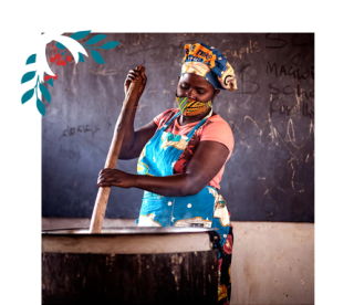 Volunteer cook making school meals. 